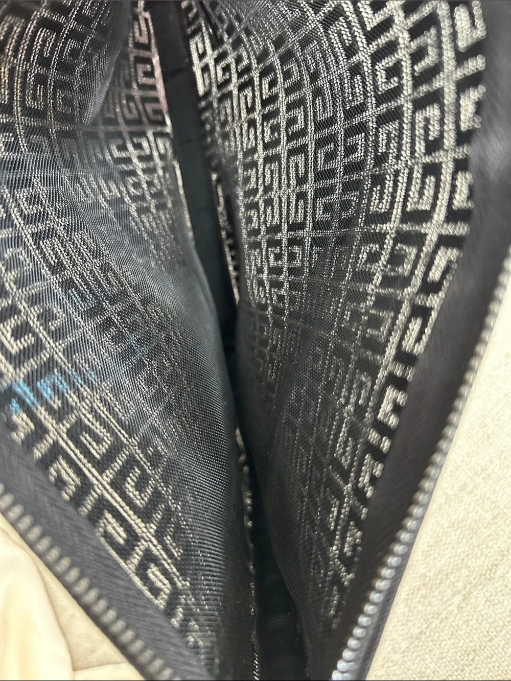 Givenchy Black Toiletry Pouch with Embossed Logo Pattern